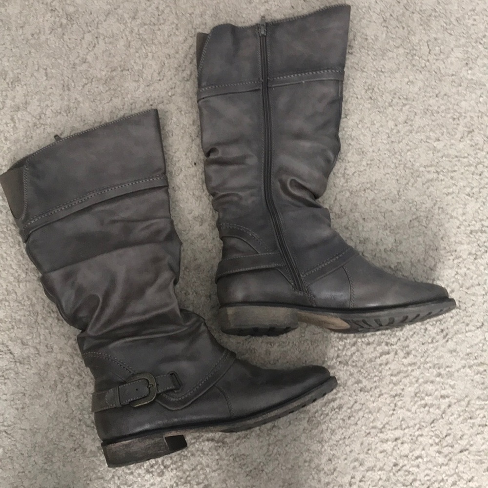 Distressed slouch woman’s gray boots